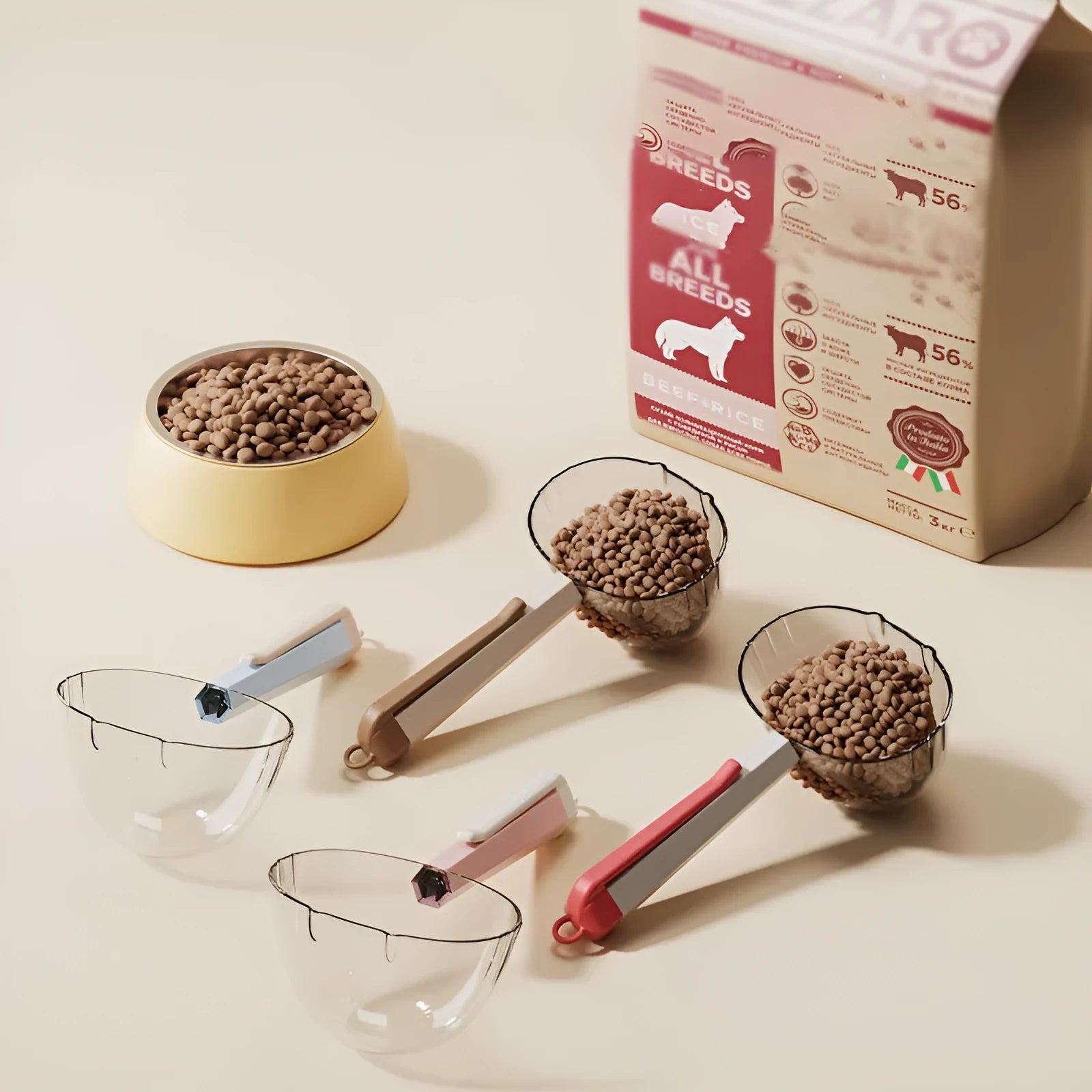 Blue pet food spoon with a metal clip attached to a dog food bag.