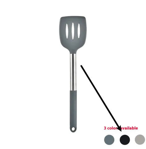 Black silicone kitchen utensil set with 12 tools in a rotating storage bucket on a kitchen countertop