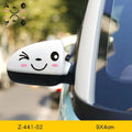 Pair of reflective cartoon eye car stickers with strong adhesive for vehicle personalisation.