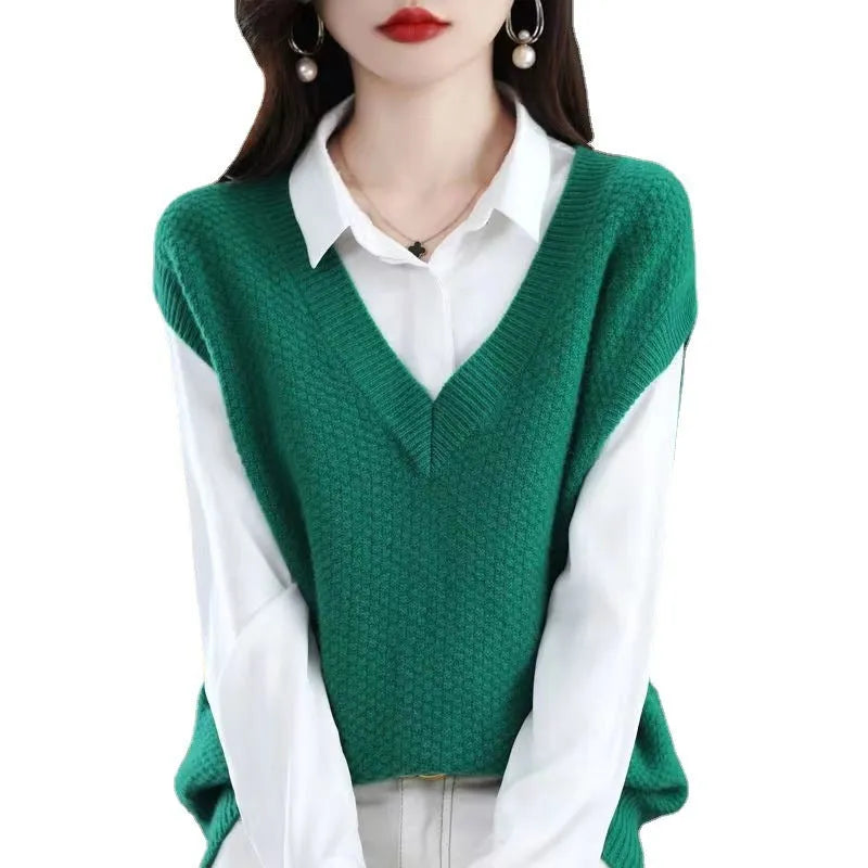 Women's beige V-neck sleeveless knitted vest with a raised 3D pattern texture