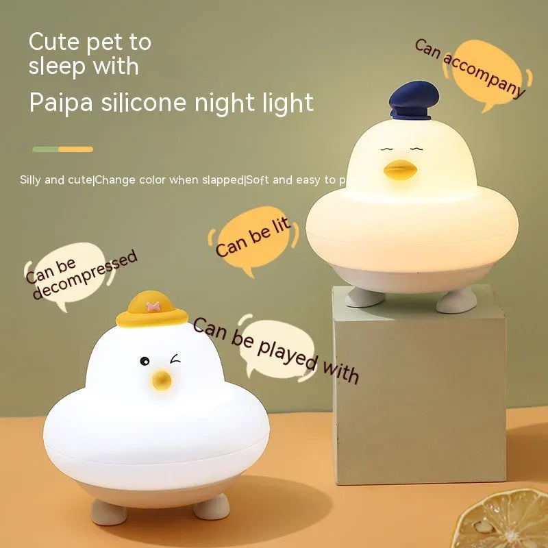 Soft silicone LED night lamp with blue duck design, 500mAh rechargeable battery, and USB charging cable