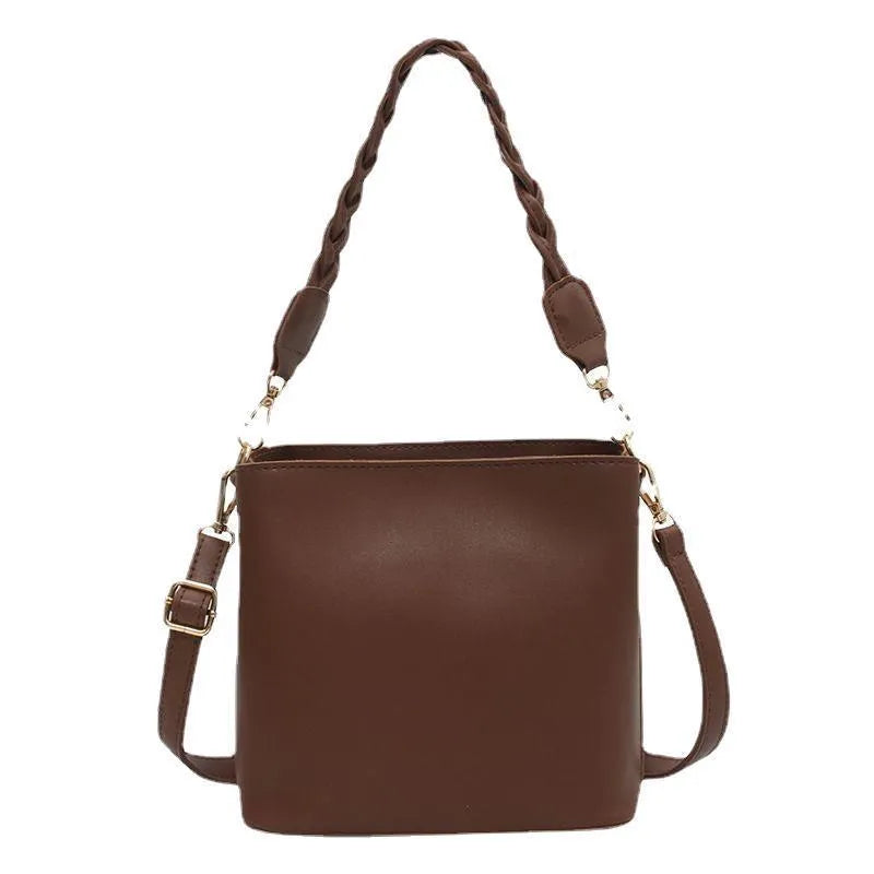 Khaki women's crossbody bucket bag with woven front texture and adjustable long strap