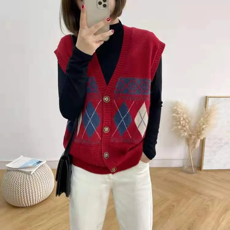 Khaki sleeveless loose cardigan top with diamond plaid pattern, open front.