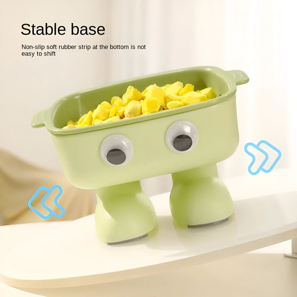 Green robot-shaped elevated cat bowl with tilted design and detachable inner section