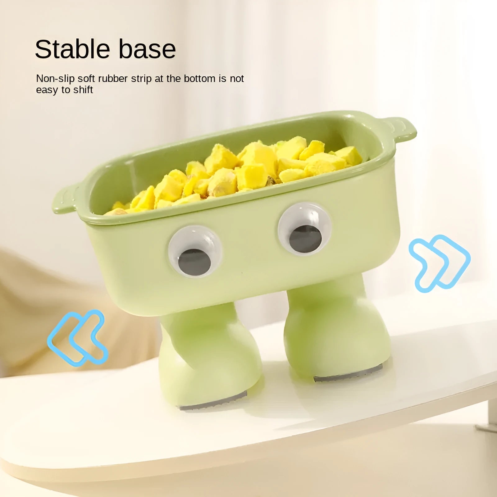 Green robot-shaped elevated cat bowl with tilted design and detachable inner section