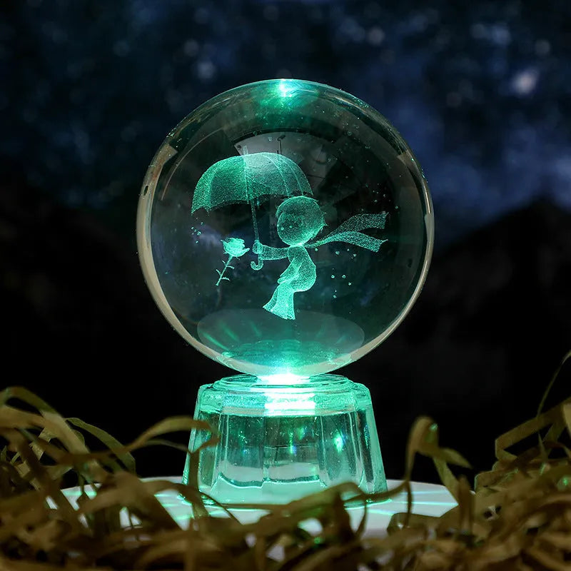 Transparent 6cm crystal ball ornament with inner carving on a fixed base, modern minimalist decor.