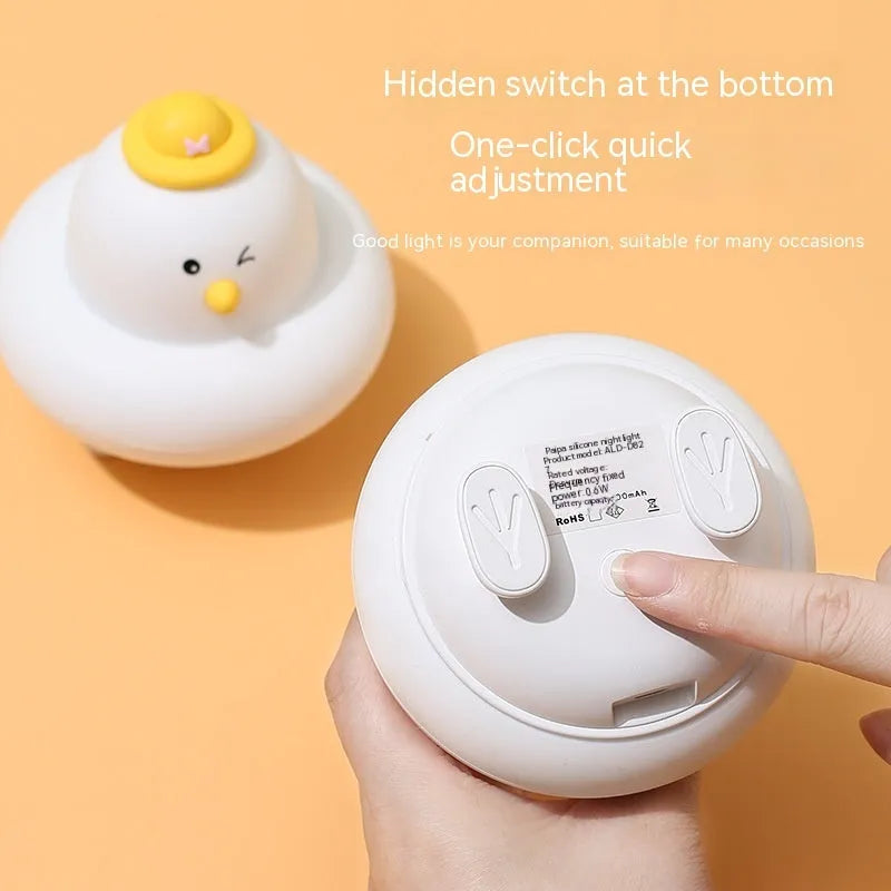 Soft silicone LED night lamp with blue duck design, 500mAh rechargeable battery, and USB charging cable