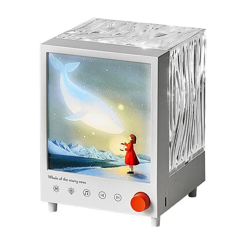 Aurora Treasure Box atmosphere projection lamp showing Star Sea Whale coloured light on a surface.
