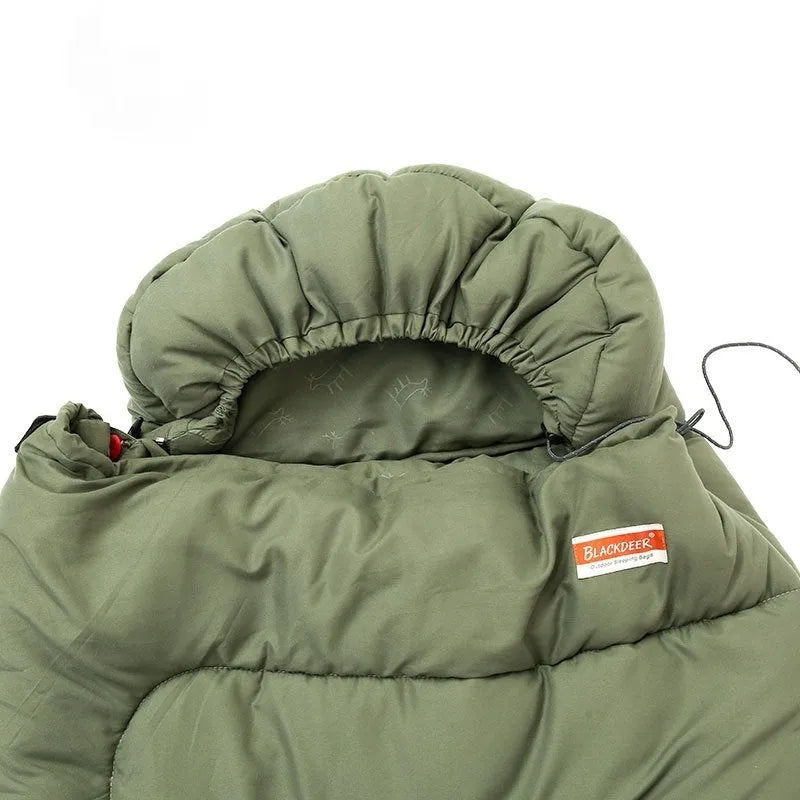 Portable ochre and olive green cotton sleeping bag quilt laid out flat, showing its quilted design for camping.