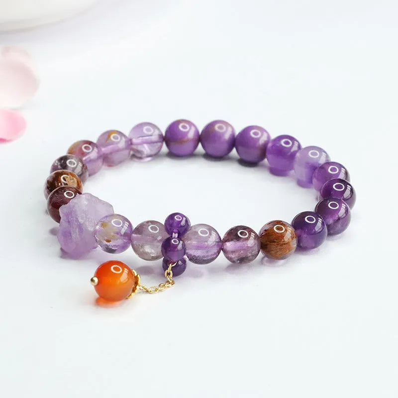 Natural nine purple amethyst crystal bracelet with red agate accents and dragon year design