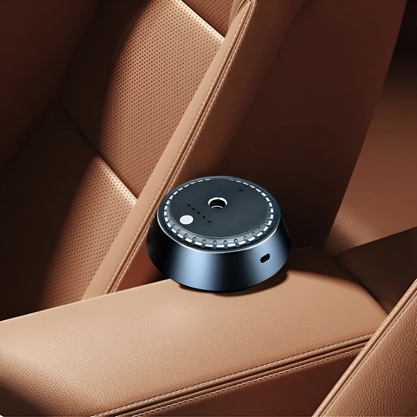 Black metal car aroma diffuser with USB charging port and 9x4.5cm dimensions