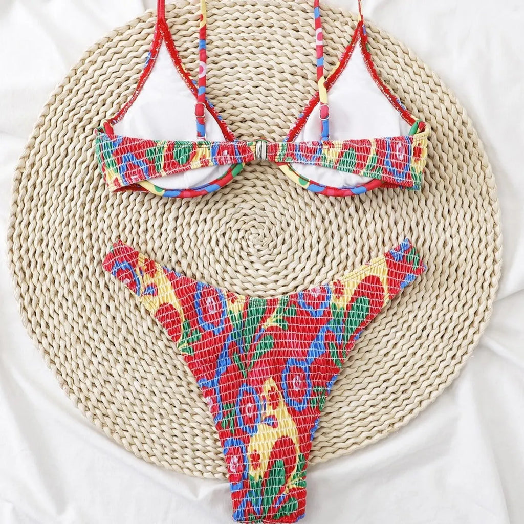 Red floral print women's underwire two-piece bikini swimsuit on a mannequin.