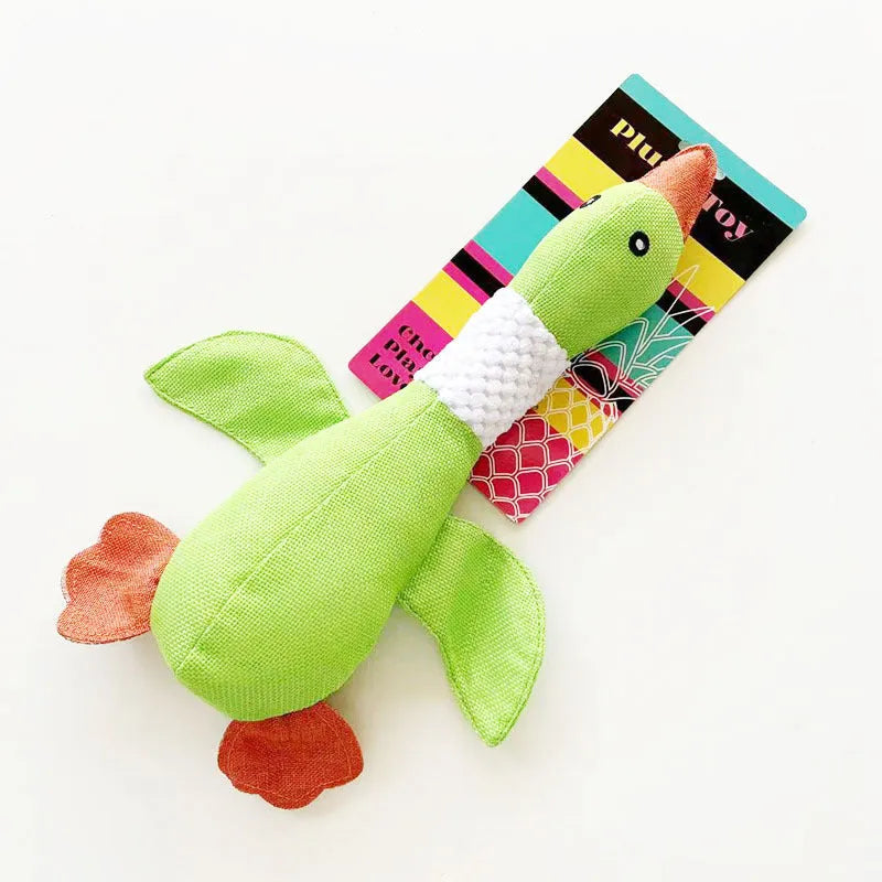 Blue, green, or grey duck-shaped plush dog toy with two squeakers.