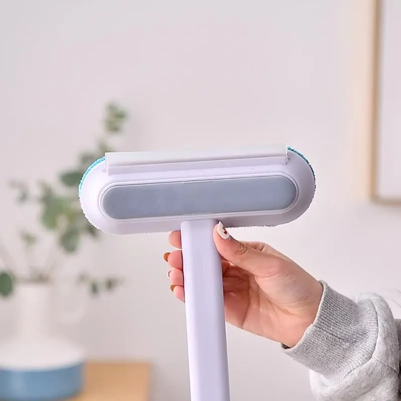 Multifunctional 4-in-1 screen cleaner and pet hair remover brush with flannel head and extension handle.