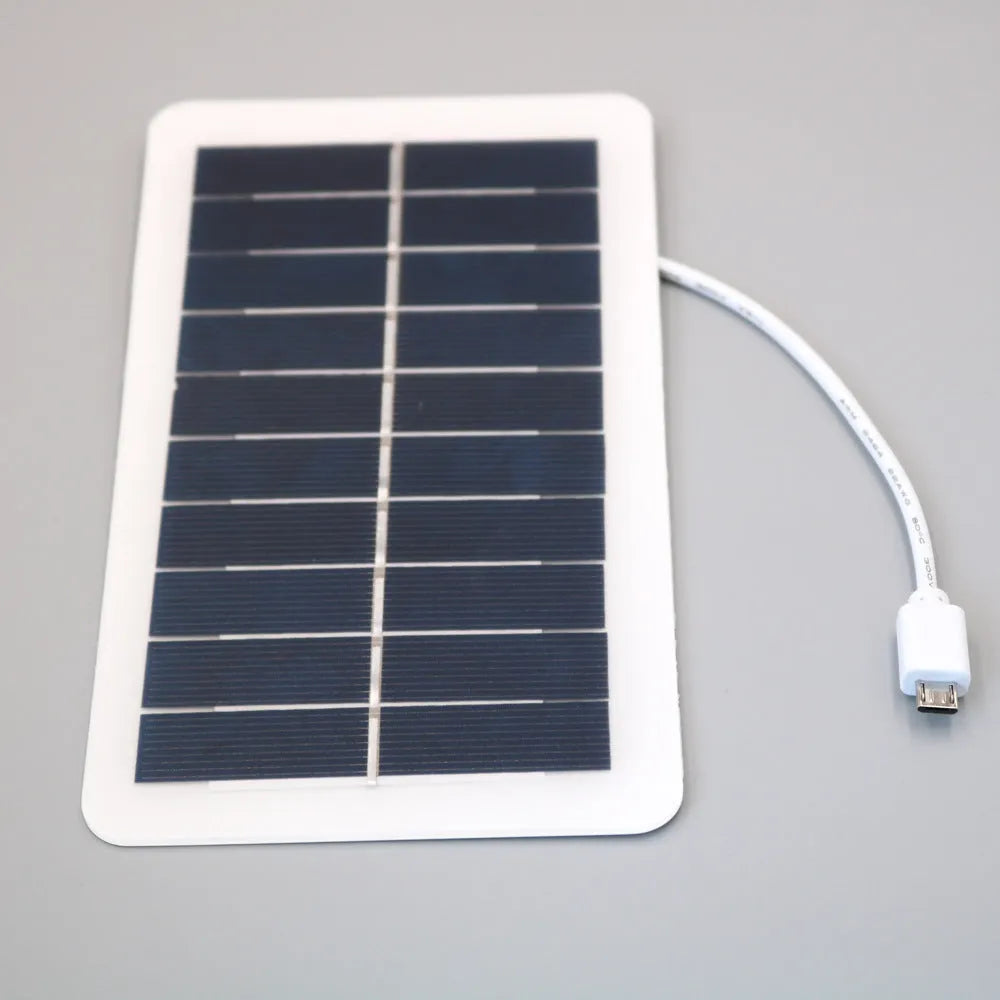 Black solar panel mobile phone charger with USB port and textured PET surface