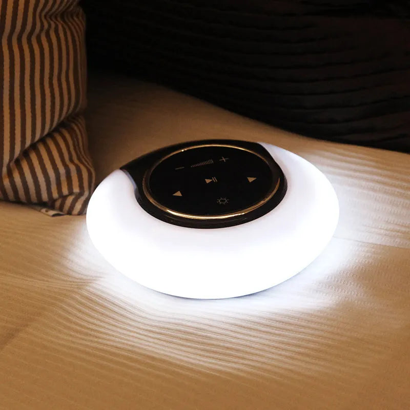 Blue folding Bluetooth desk lamp speaker with touch controls and LED lighting