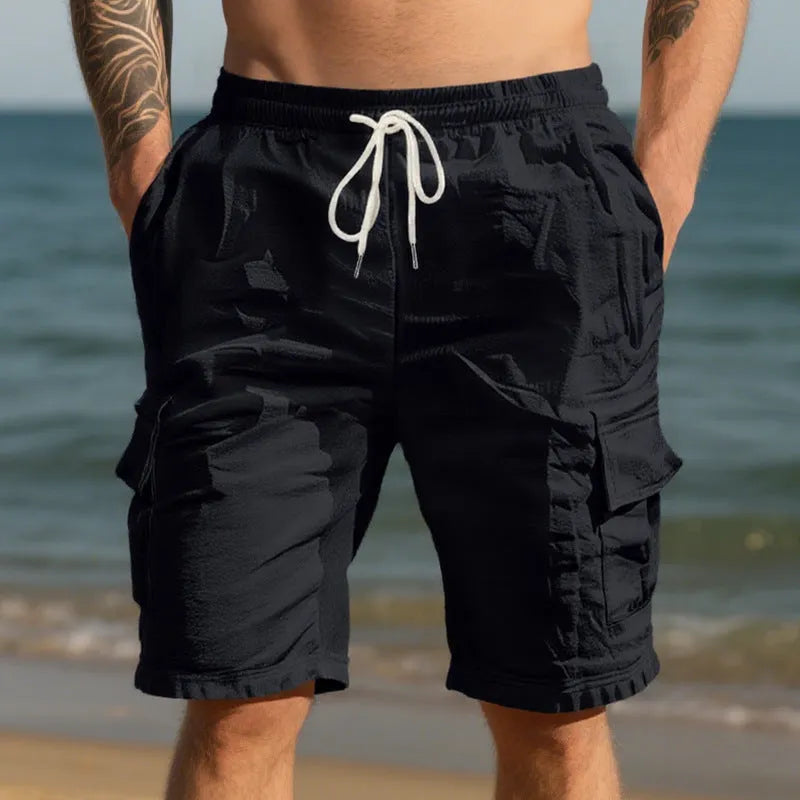 Men's straight-leg linen casual shorts in a light blue colour, showing front view with pockets.