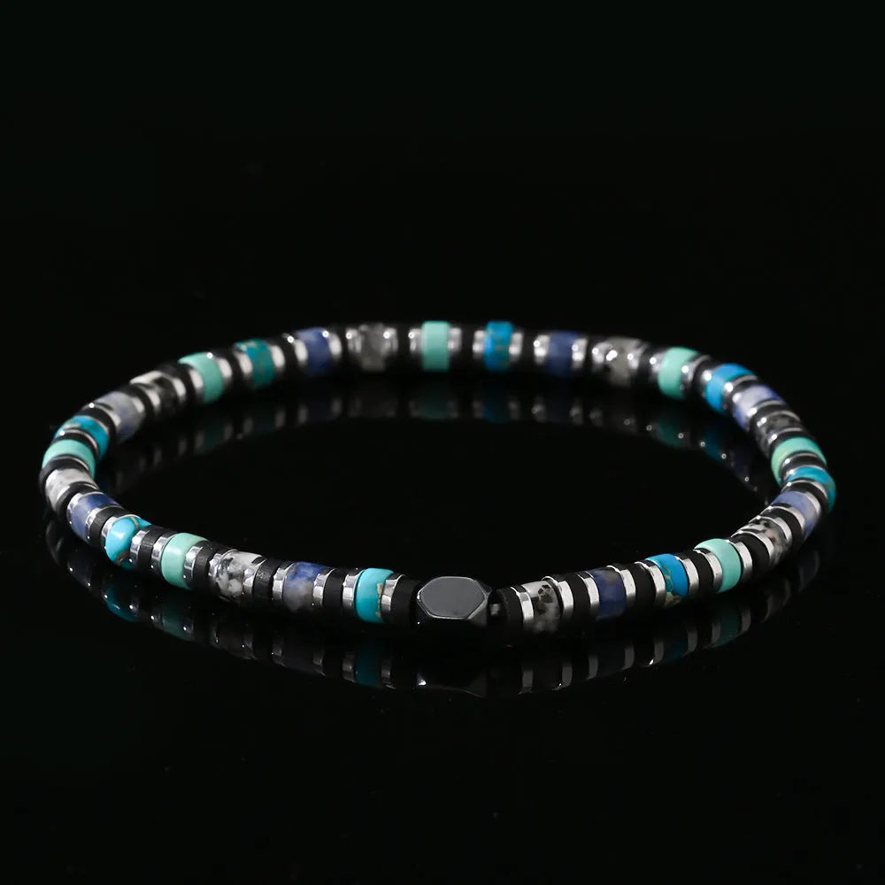 Bohemian bracelet with cylindrical semi-precious stone beads in a hand-woven geometric design.
