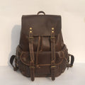Brown coffee genuine leather men's backpack with air cushion shoulder straps showing first layer cowhide texture