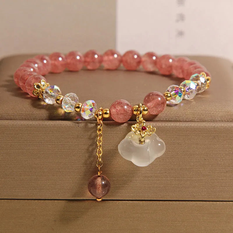 Women's natural crystal bracelet with strawberry quartz beads, white agate beads, and traditional auspicious cloud charm