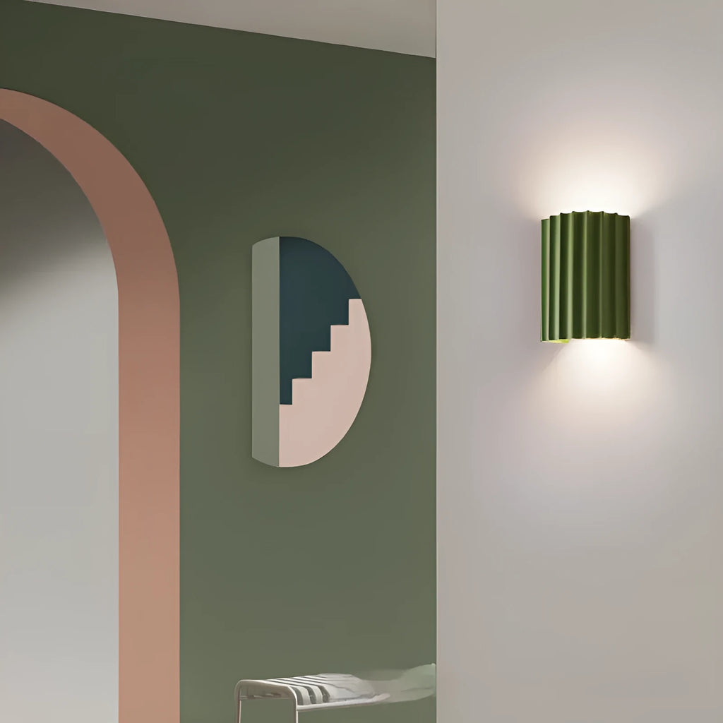 Nordic macaron-shaped wall light for hallways in a choice of five colours.