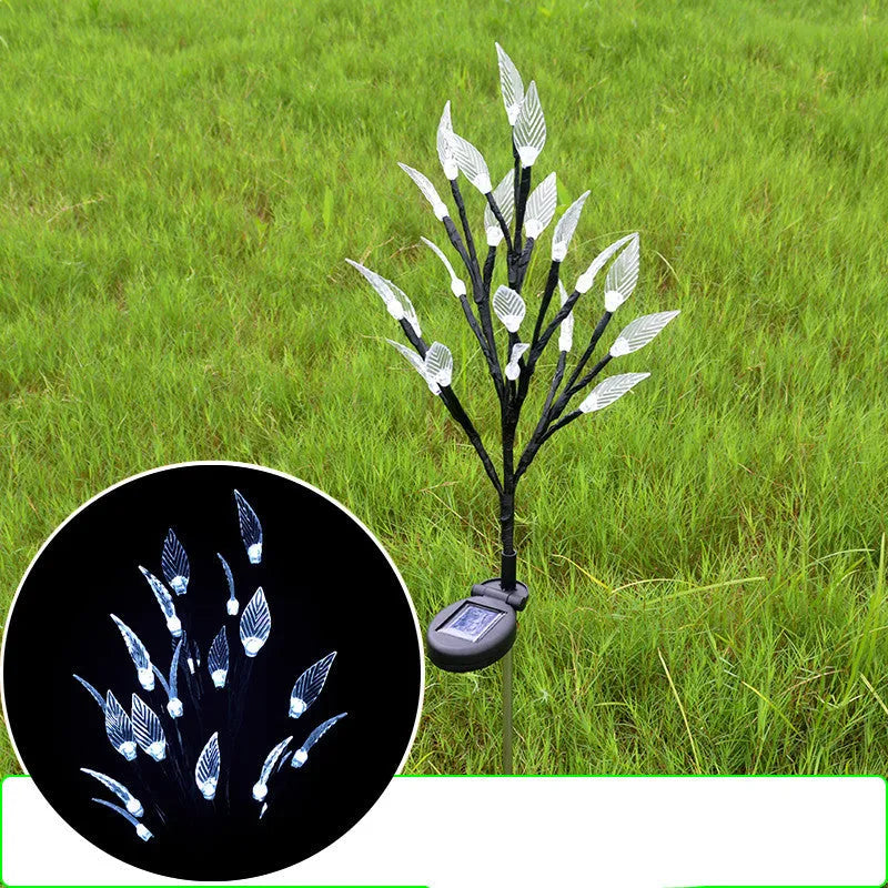 Three solar-powered garden lights with leaf branch design for lawn decoration