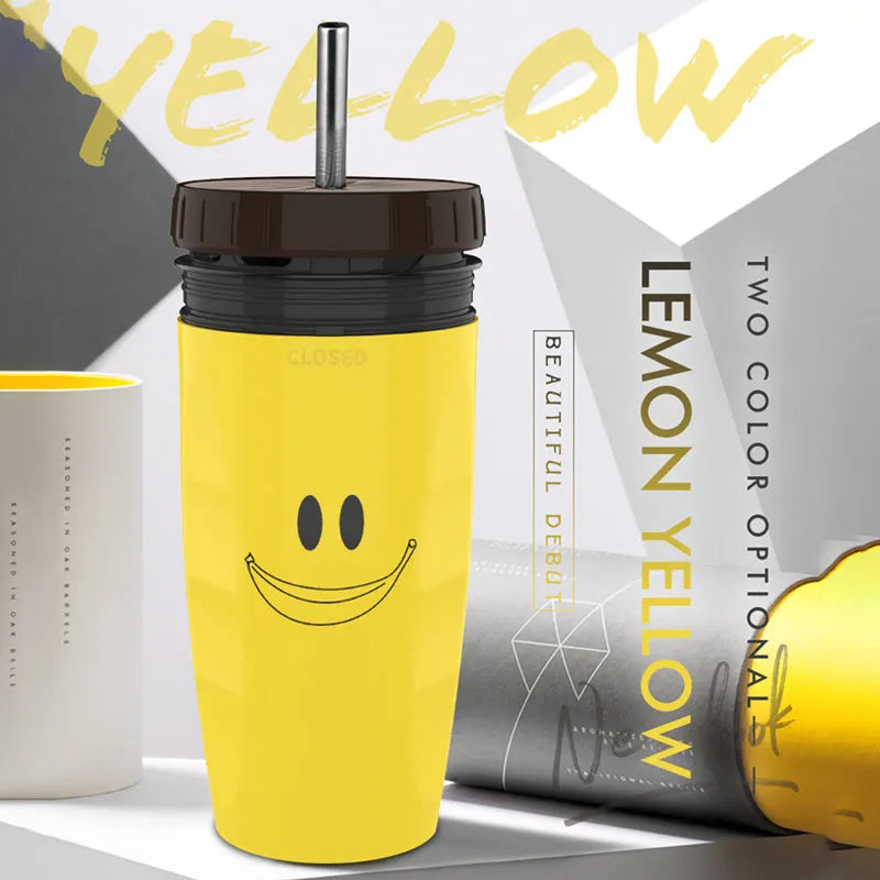 Double wall insulated travel tumbler with twist seal showing cartoon patterns and straw