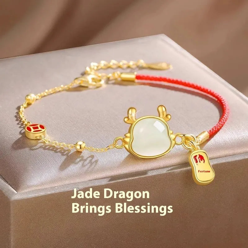 Silver-plated dragon zodiac bracelet with Hetian jade elements for women, showing electroplated finish and animal motif.