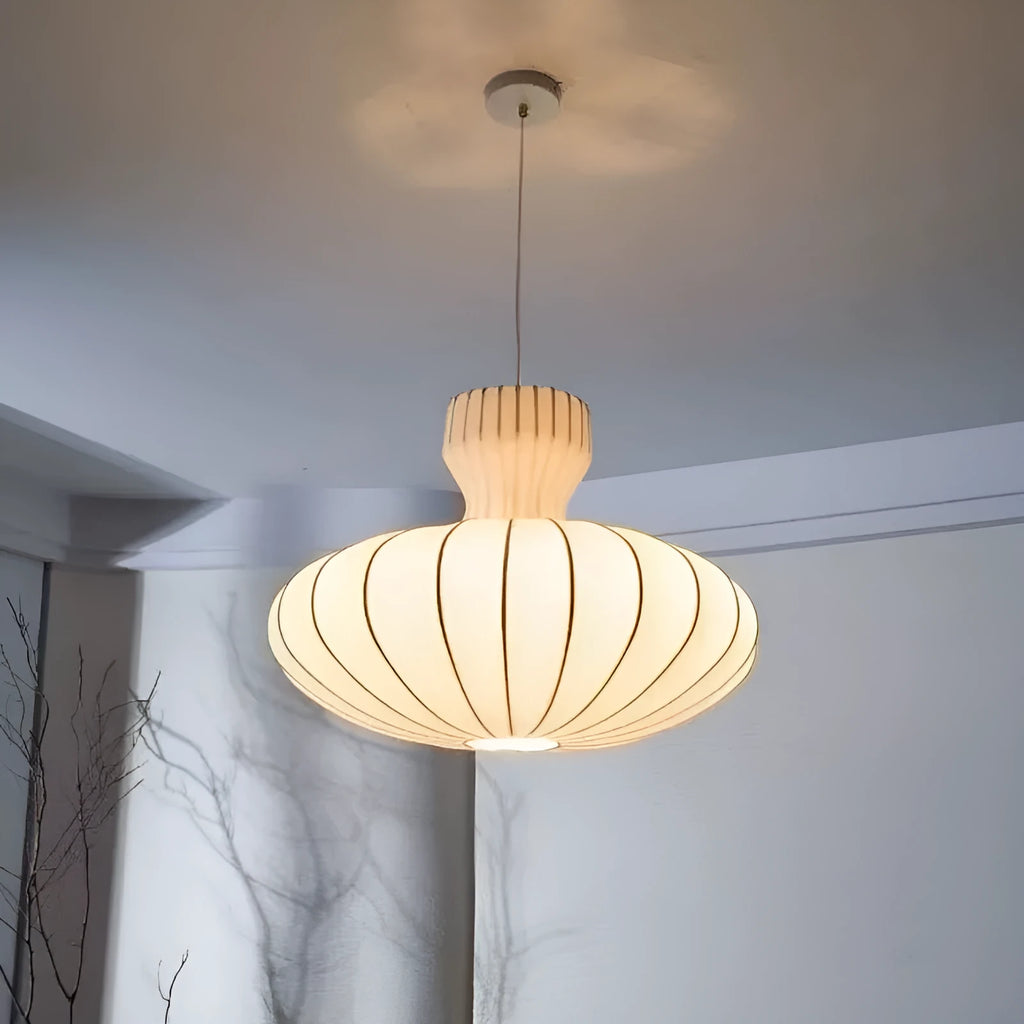 Vintage Chinese-style chandelier with a multi-arm design and glass shades, shown in a dining room setting.