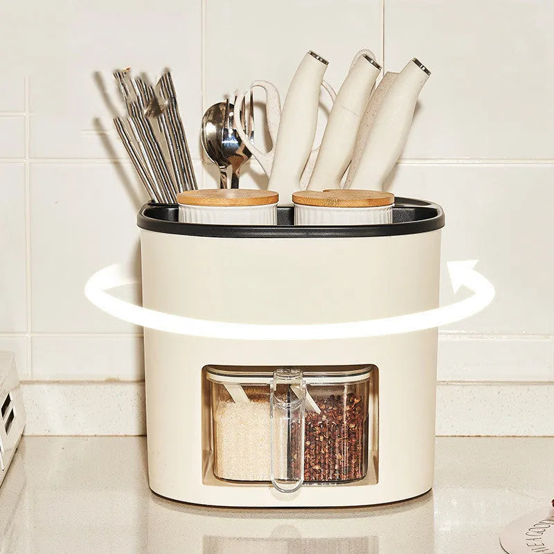White rotating kitchen storage bucket with four compartments for cutlery and a separate spice box organiser.