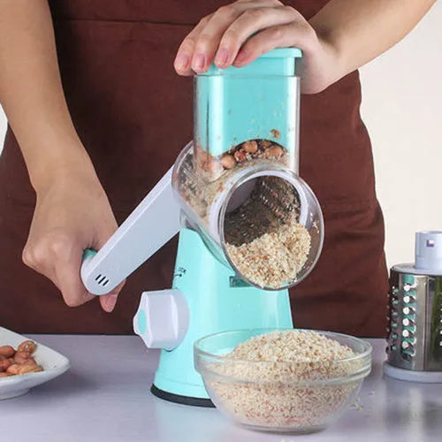 Round manual mandoline slicer with stainless steel blades in blue, green, or red colour