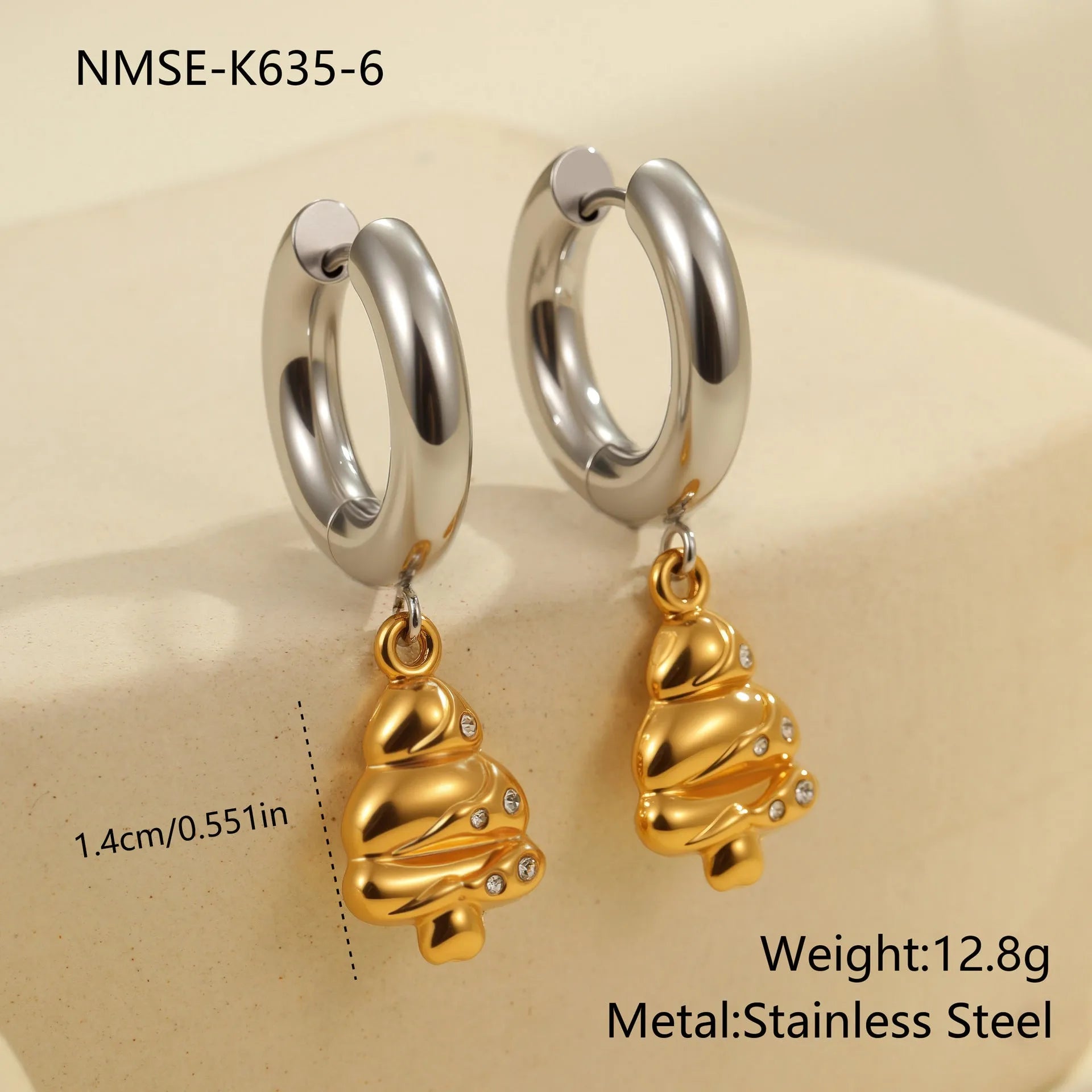 Women's stainless steel earrings with 18K gold plating in heart, star, and Christmas tree shapes.
