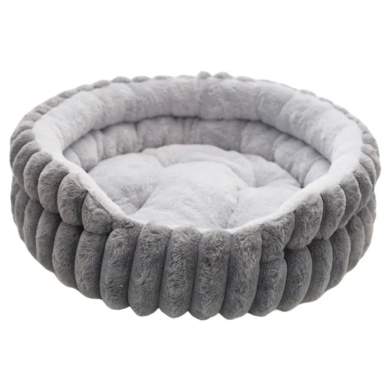Round plush cat bed in grey, 50cm diameter, on a wooden floor