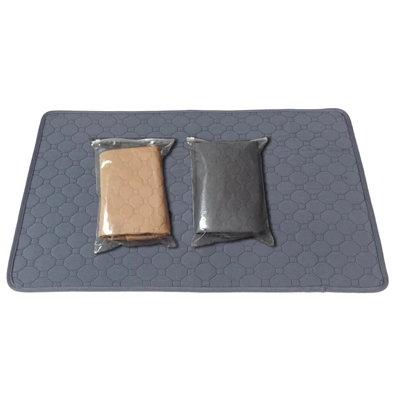 Washable dog pee pads in grey and tan colours showing waterproof backing and triple-stitch edges