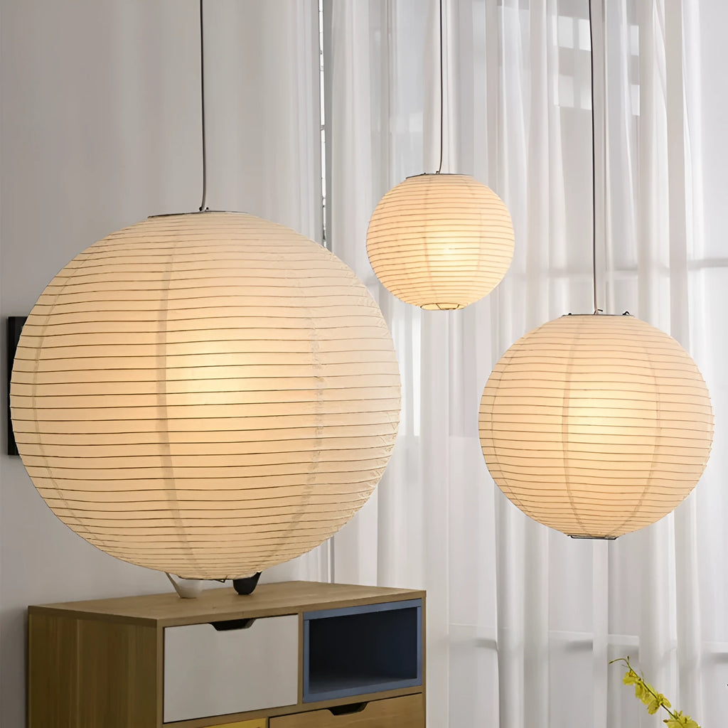 Modern simple style paper pendant chandelier with a choice of flat or spherical lampshades.