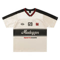 Apricot coloured V-neck sports jersey with short sleeves and letter pattern detail