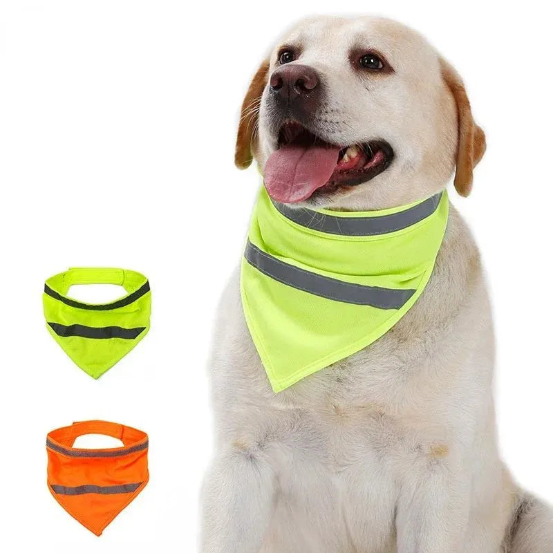 Yellow and orange reflective dog bandana with striped design and adhesive strap, shown on a dog's neck.