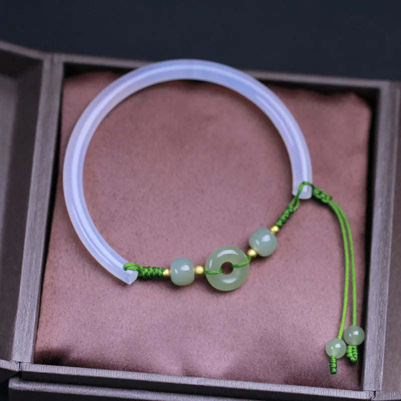 Handmade white agate half bracelet with peace buckle closure and hand-woven bead construction