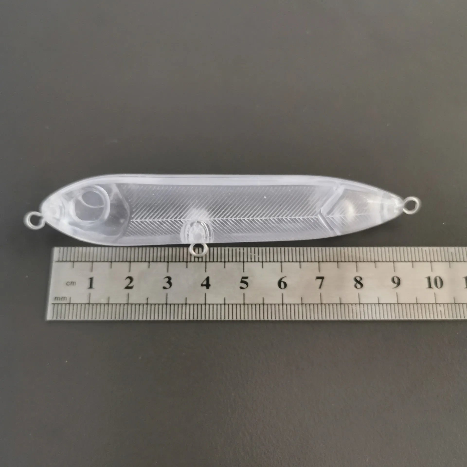 Transparent 9.5cm long ABS plastic blank fishing lure body with a 7mm slot for a fish eye.