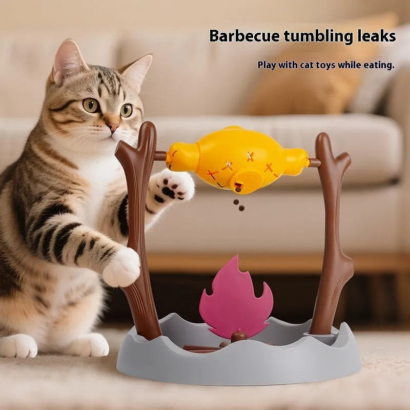 Large barbecue-themed tumbling cat feeder toy on floor, dimensions 30cm by 30cm by 29cm.