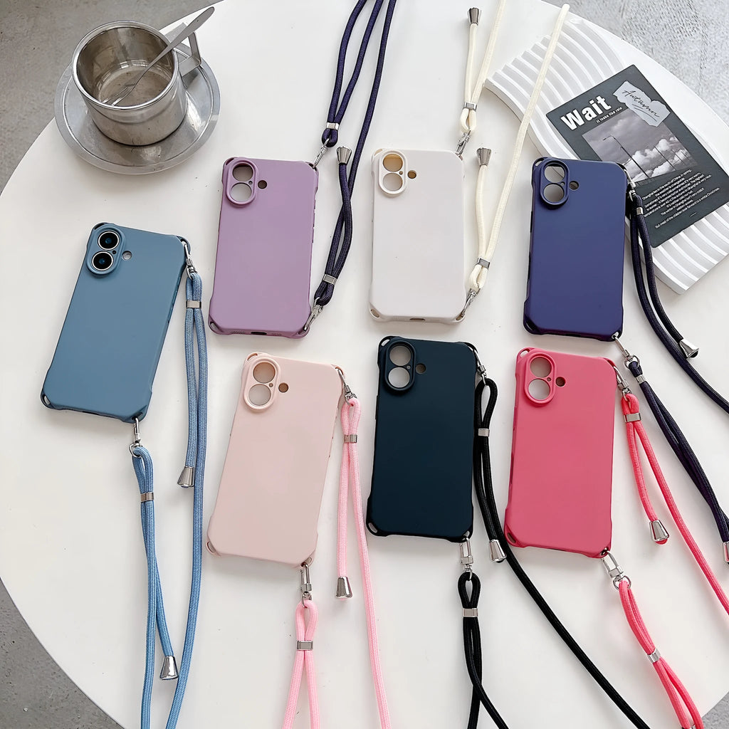 Four-corner cross lanyard liquid silicone phone case for Apple iPhone 16 Pro Max in black with detachable crossbody strap