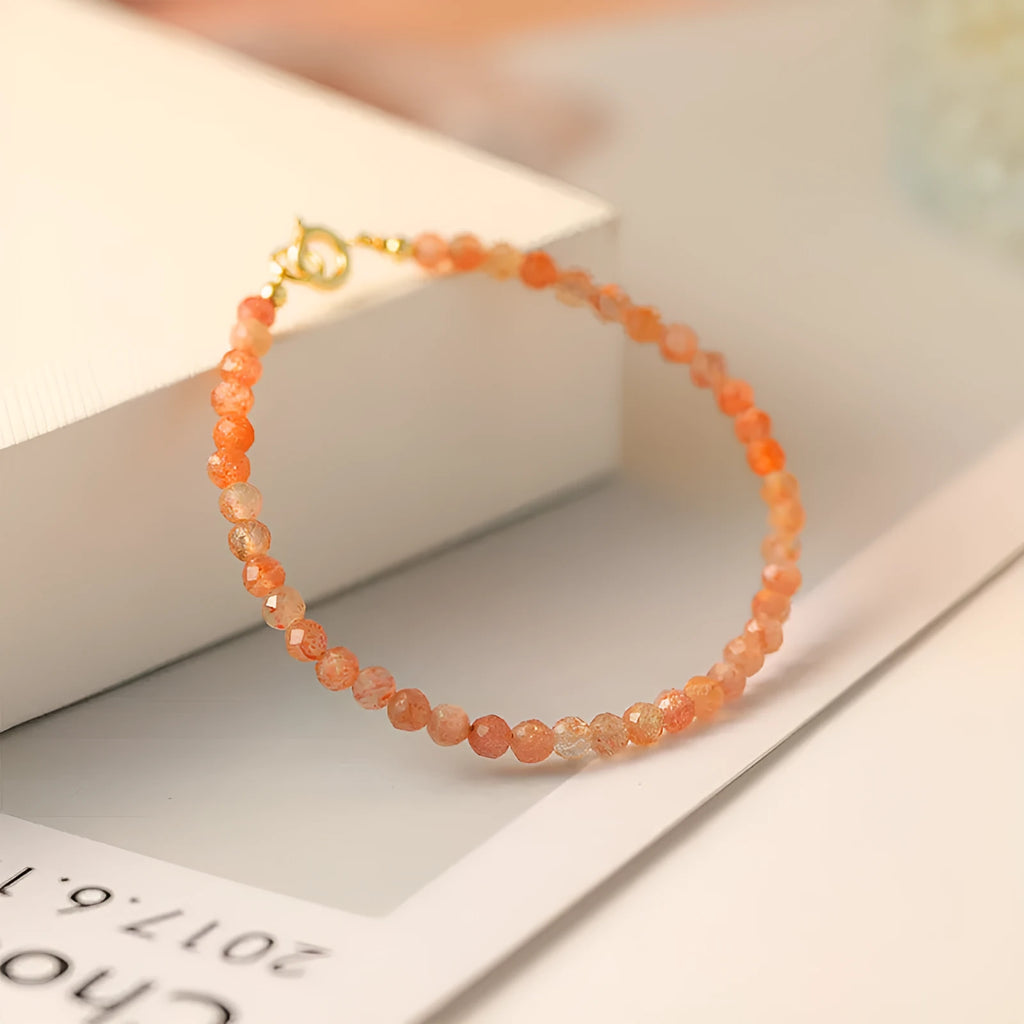 Ultra-thin 3mm sunstone bead bracelet with natural crystal beads on wrist