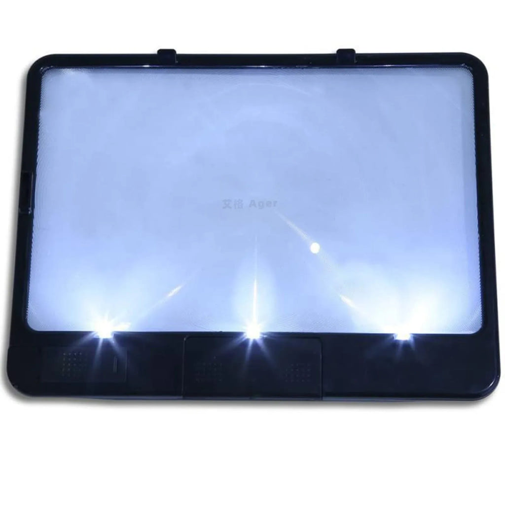 Black desktop magnifying glass with LED light showing large rectangular lens and PVC handle