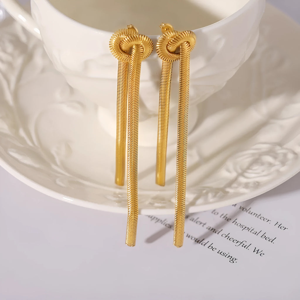 Gold electroplated titanium steel necklace with knotted tassel pendant and matching earrings set