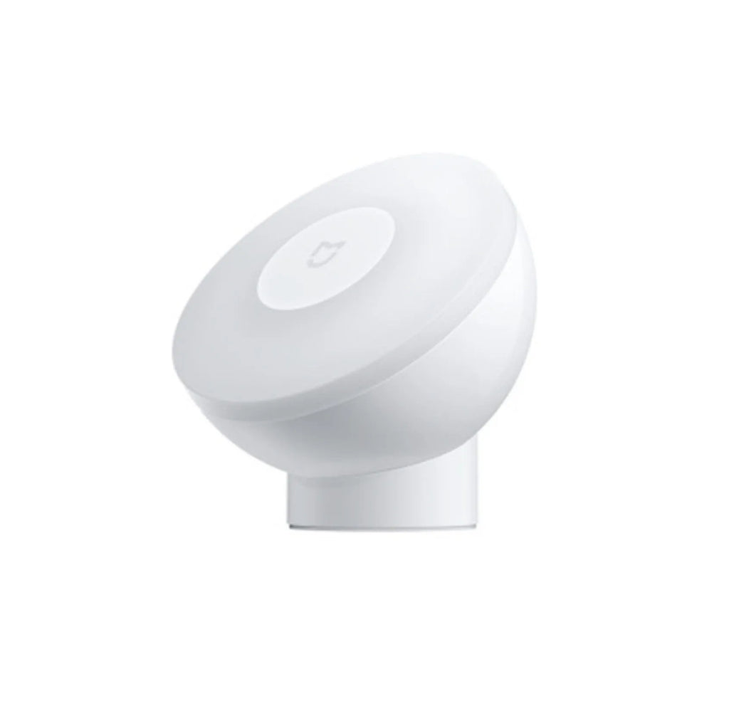 White modern bedside table lamp with human body induction and Bluetooth.