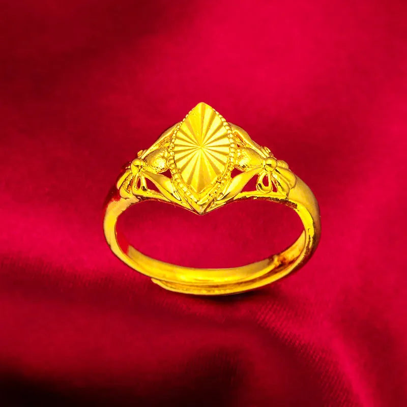 Alluvial gold electroplated brass ring with open diamond flower design and geometric texture
