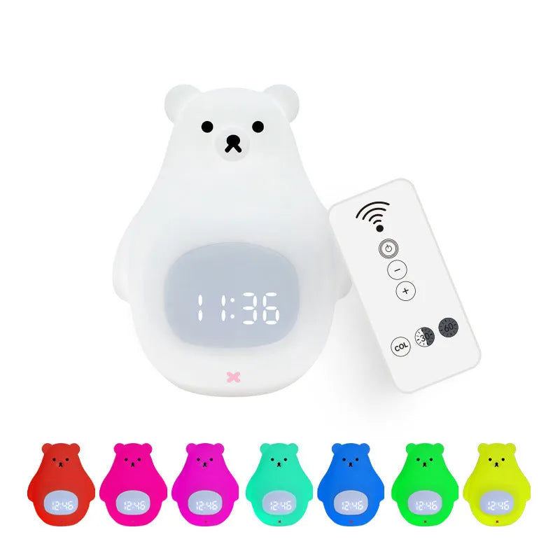 Big White Bear shaped silicone night light with remote control on a bedside table.