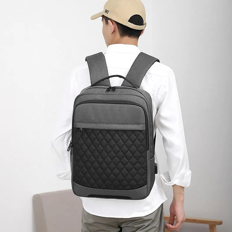 Men's leisure travel backpack in Oxford cloth with curved shoulder straps and diamond mesh back panel