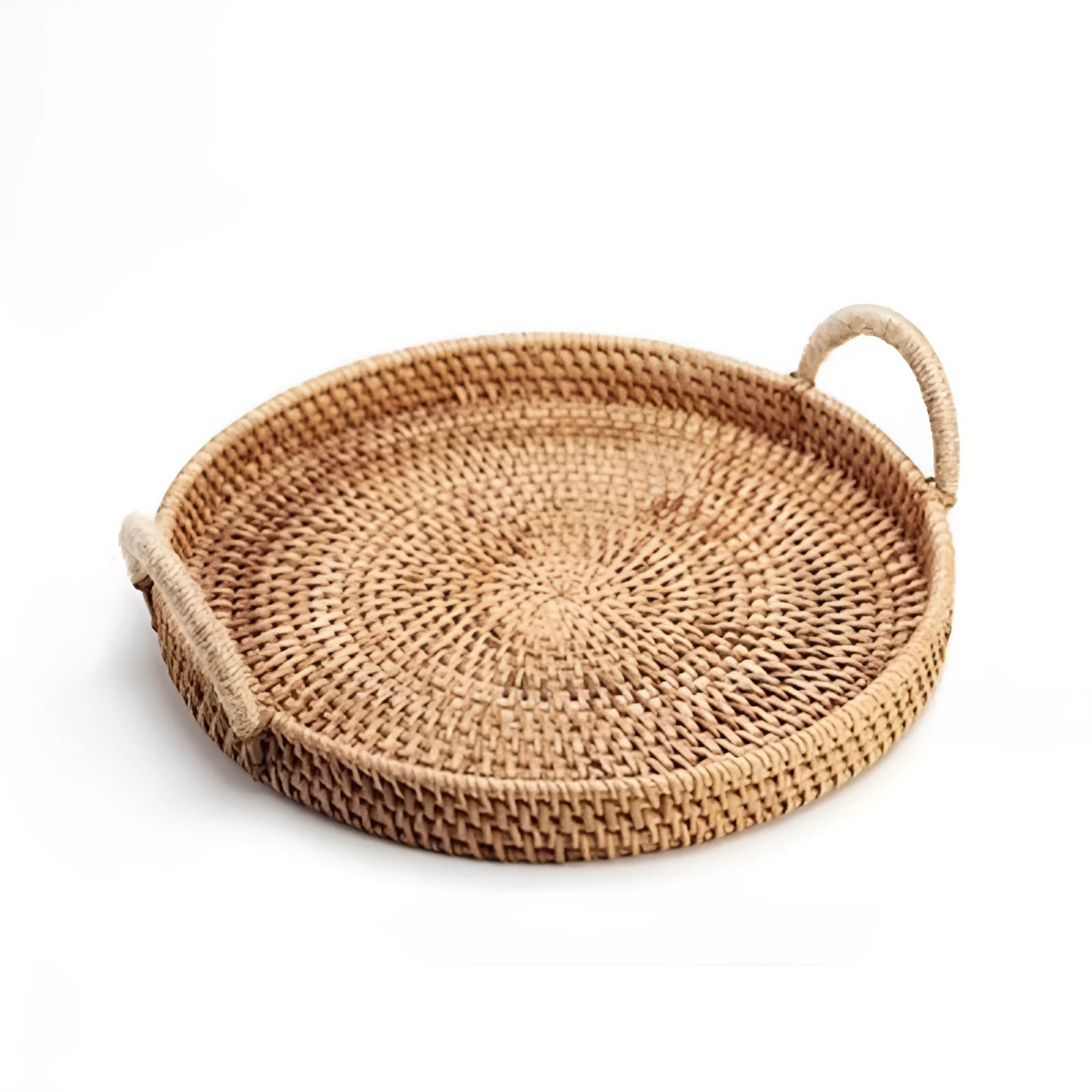 Round handwoven rattan storage basket with a light wooden handle on a table.