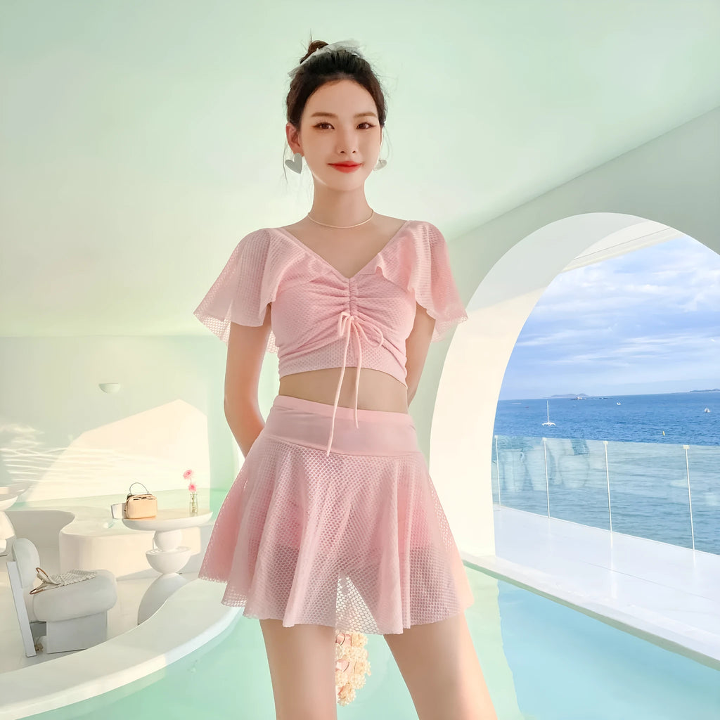 White women's two-piece skirt swimsuit set with top and skirt